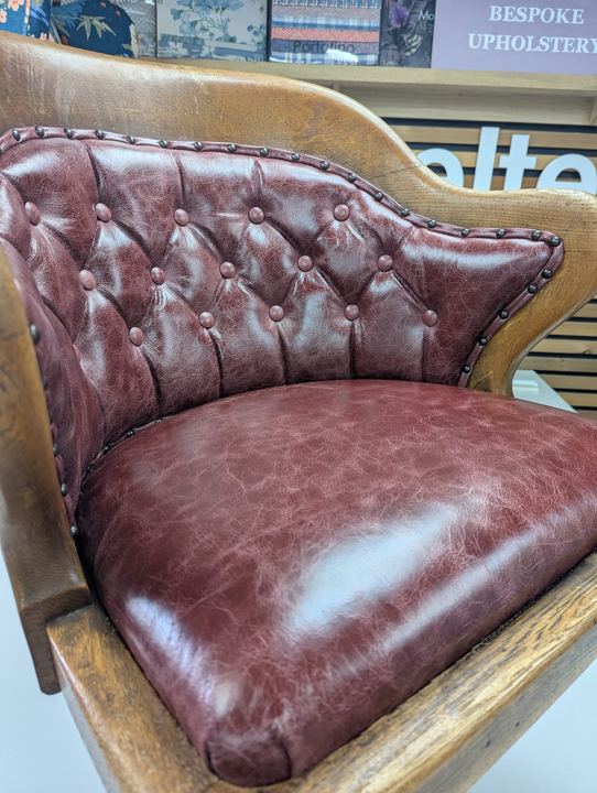Close-up of the deep-buttoned leather back