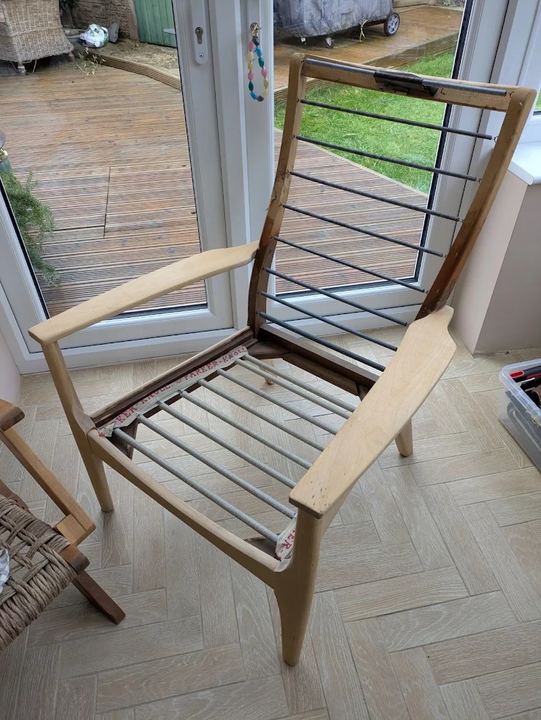 Parker Knoll armchair before, as a bare wooden frame