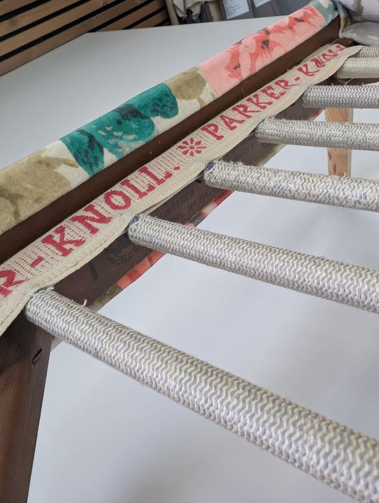 The spring rail with its original Parker Knoll label