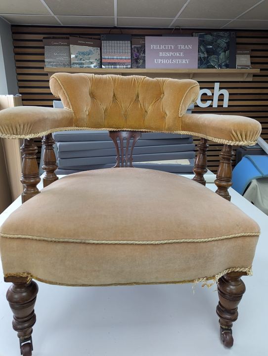 Victorian tub chair before: worn and faded gold velvet